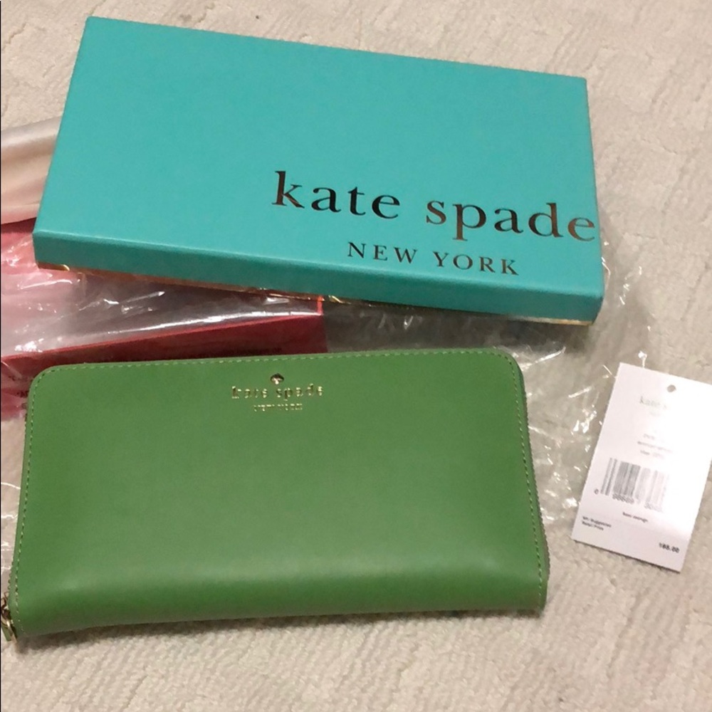 Kate Spade long zip all around wallet (“lacey”)